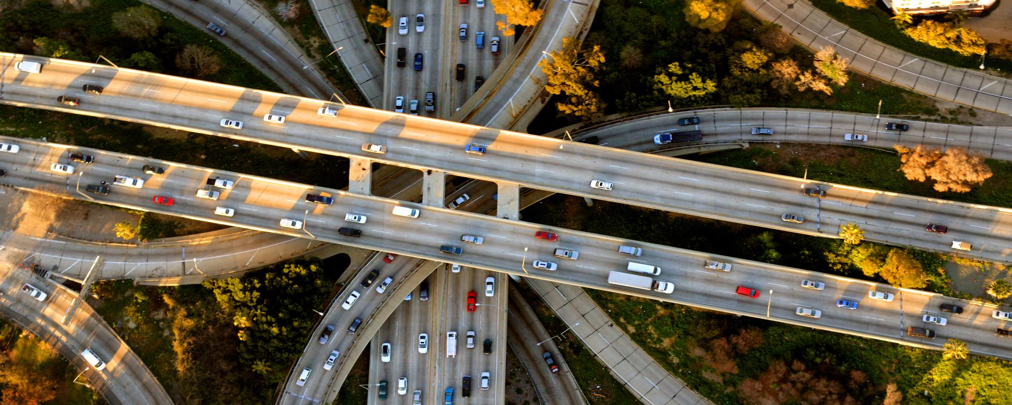 Helicopter Aerial View of the famous Los Angeles Four Level freeway interchange