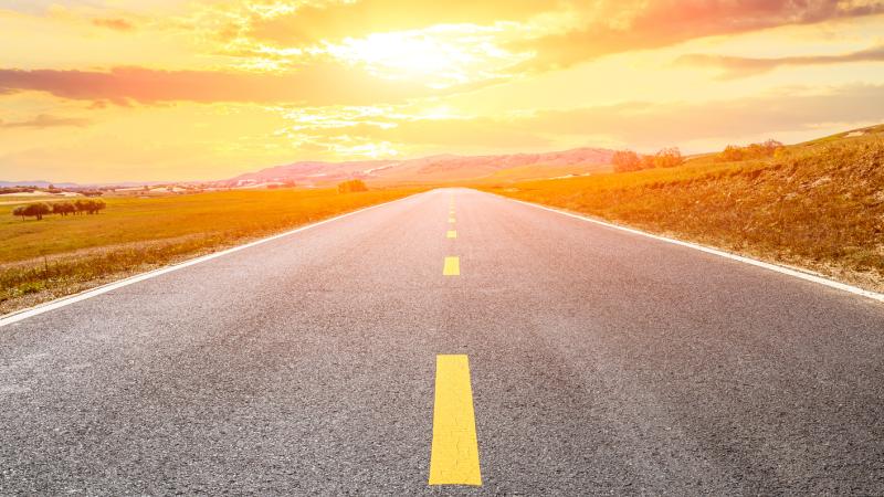 Empty asphalt road and beautiful cloud landscape at sunset.